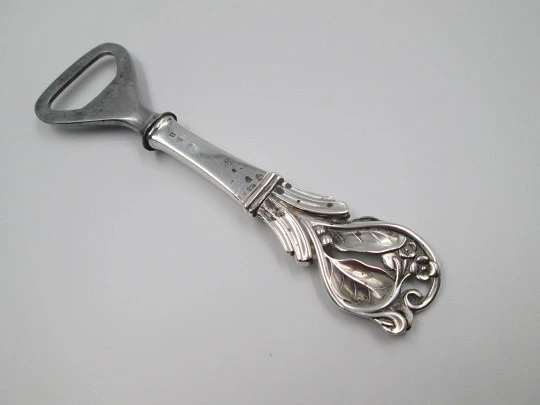 Johannes Siggaard bottle opener. Silver and steel. Floral & vegetable motifs. Denmark