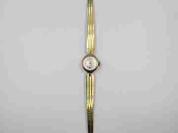 Jsoma. Acero / laminado oro. Cuerda manual. Suiza. Brazalete. Mujer