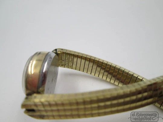 Jsoma. Acero / laminado oro. Cuerda manual. Suiza. Brazalete. Mujer