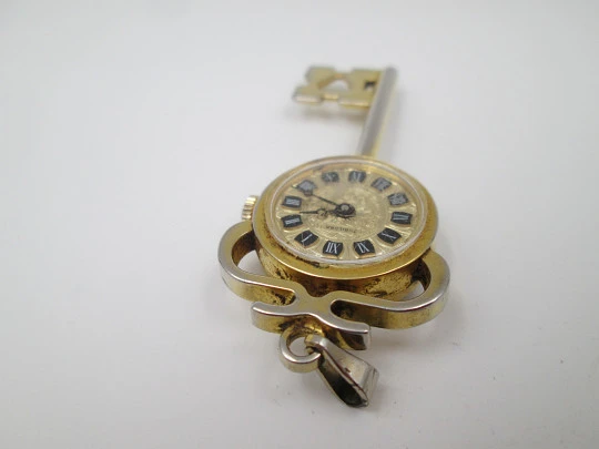 Jubilora pendant watch. Gold plated and steel. Key shape. Manual wind. Swiss. 1970's Jubilora pendant watch. Gold plated and steel. Key shape. Manual wind. Swiss. 1970's