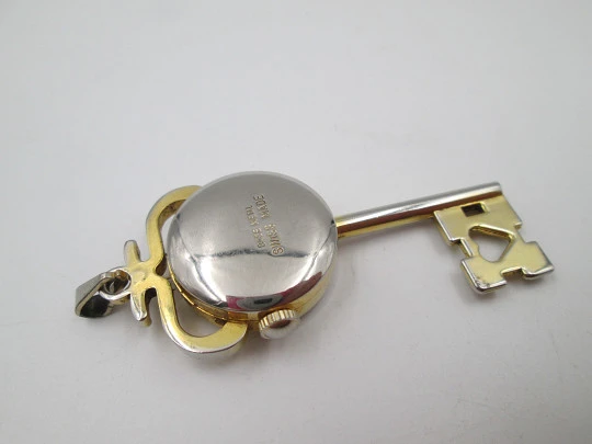 Jubilora pendant watch. Gold plated and steel. Key shape. Manual wind. Swiss. 1970's Jubilora pendant watch. Gold plated and steel. Key shape. Manual wind. Swiss. 1970's