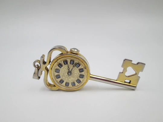 Jubilora pendant watch. Gold plated and steel. Key shape. Manual wind. Swiss. 1970's Jubilora pendant watch. Gold plated and steel. Key shape. Manual wind. Swiss. 1970's