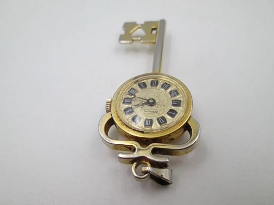 Jubilora pendant watch. Gold plated and steel. Key shape. Manual wind. Swiss. 1970's Jubilora pendant watch. Gold plated and steel. Key shape. Manual wind. Swiss. 1970's