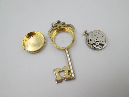 Jubilora pendant watch. Gold plated and steel. Key shape. Manual wind. Swiss. 1970's Jubilora pendant watch. Gold plated and steel. Key shape. Manual wind. Swiss. 1970's