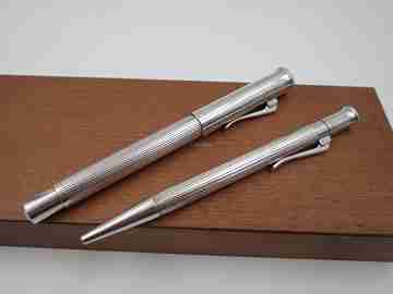 Juego estilográfica y bolígrafo Faber-Castell Classic. Metal platinado. Caja. 2010