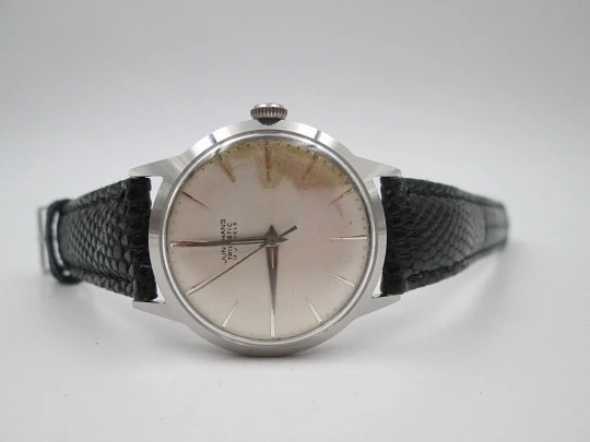 Junghans Trilastic. Stainless steel. Manual wind. Germany. Leather strap. 1970's