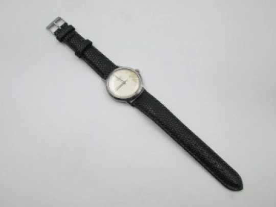 Junghans Trilastic. Stainless steel. Manual wind. Germany. Leather strap. 1970's