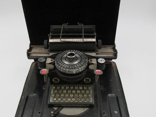 Junior typewriter toy. Black enamel tinplate. Original box. 1920's. Germany