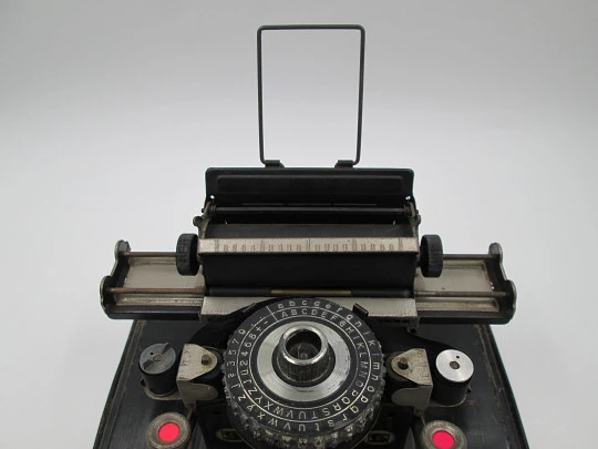 Junior typewriter toy. Black enamel tinplate. Original box. 1920's. Germany