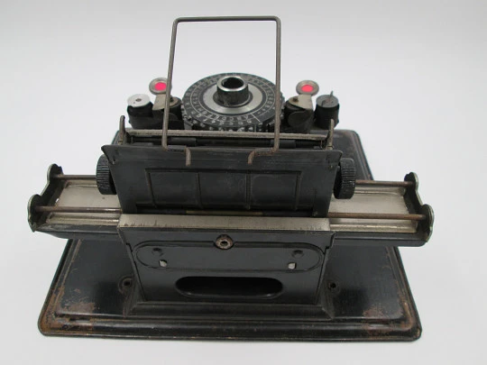 Junior typewriter toy. Black enamel tinplate. Original box. 1920's. Germany