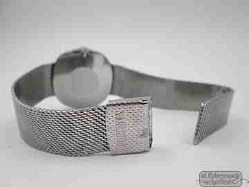 Juvenia Reserve. Acero inoxidable. Cuerda manual. Brazalete malla. 1960