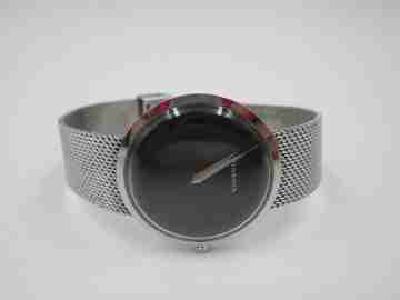 Juvenia. Manual wind. Stainless steel. Mesh bracelet. 1970's. Black dial