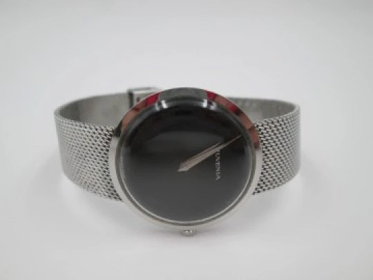 Juvenia. Manual wind. Stainless steel. Mesh bracelet. 1970's. Black dial