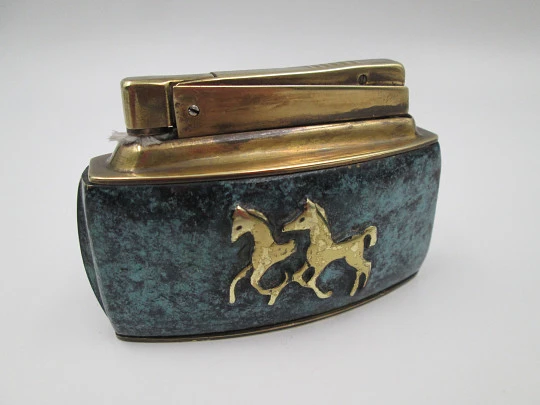 Karl Wieden desk petrol lighter. Bronze and malachite. Horses motif. Germany. 1930's
