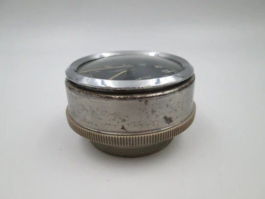 Kienzle car dash-clock. Silver plated metal. Black dial. 8 days wind-up. Germany. 1940's