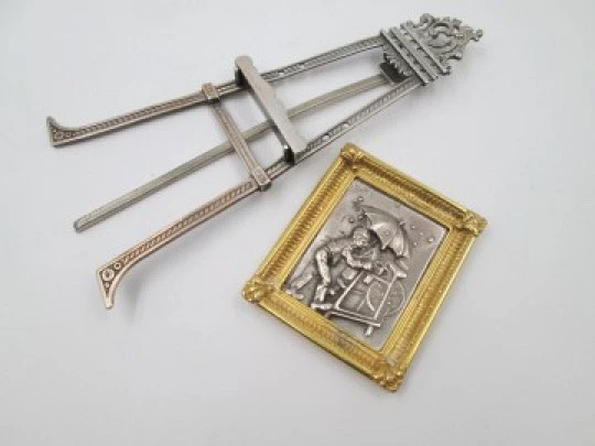 Knife sharpening man miniature picture frame with table tripod. 1990's