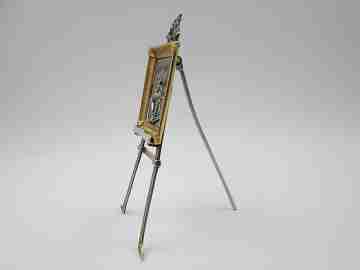 Knife sharpening man miniature picture frame with table tripod. 1990's
