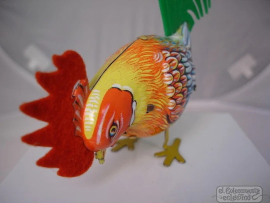 Köhler wind-up toy. Lithographed tinplate. Rooster. Germany. 1960's