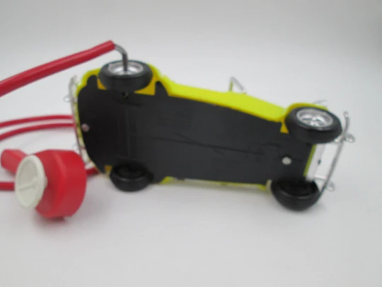 La Paz Toys convertible car. Colored plastic. Spring and flywheel. 1970's. Spain (Ibi)