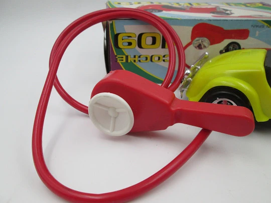 La Paz Toys convertible car. Colored plastic. Spring and flywheel. 1970's. Spain (Ibi)