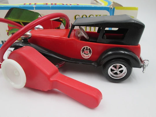 La Paz Toys police car. Colored plastic. Spring and flywheel. 1970's. Spain (Ibi). Original box