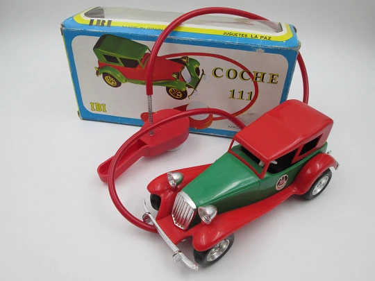 La Paz Toys police car. Colored plastic. Spring and flywheel. 1970's. Spain (Ibi). Original box