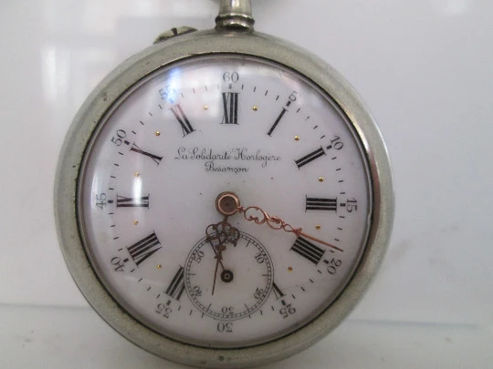 La Solidarité Horlogère Besançon. Metal blanco. Cuerda remontoir