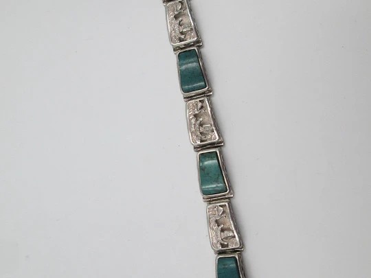 Ladie's articulated bracelet. 925 sterling silver & malachites. Chiseled scenes. Peru. 1980's