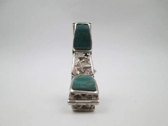 Ladie's articulated bracelet. 925 sterling silver & malachites. Chiseled scenes. Peru. 1980's