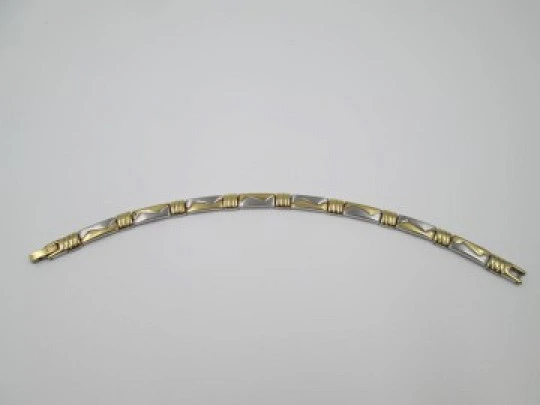 Ladie's articulated bracelet. Stainless steel and 18k gold plated. 1980's