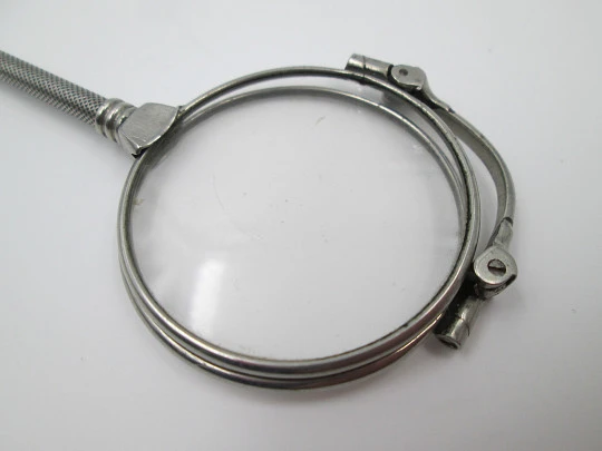 Ladies lorgnette. Folding opera glasses. White metal. 1910's