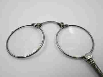 Ladies lorgnette. Folding opera glasses. White metal. 1910's