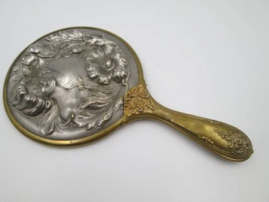 Ladie's modernist beveled hand mirror. Brass and tin. Woman engraving. 1940's