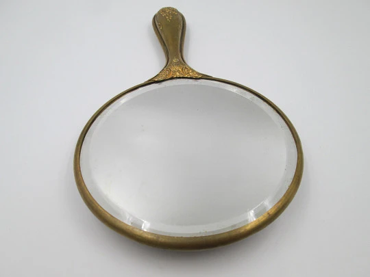 Ladie's modernist beveled hand mirror. Brass and tin. Woman engraving. 1940's