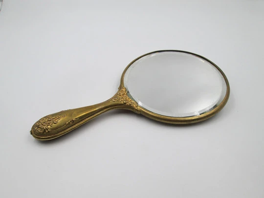 Ladie's modernist beveled hand mirror. Brass and tin. Woman engraving. 1940's