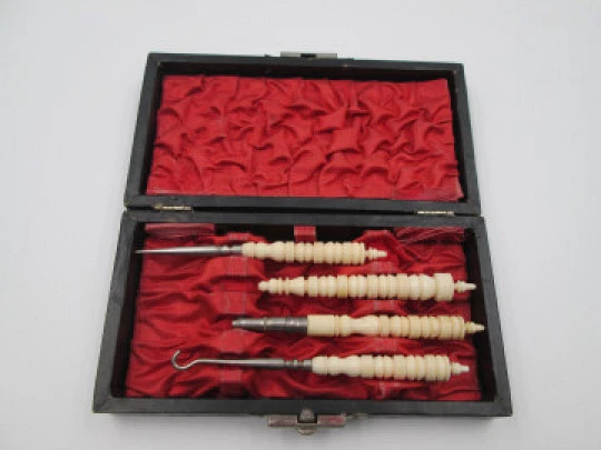 Ladies travel set. Buttons hook, awl, pencil & refills box. Ribbed bone and metal. 1930's