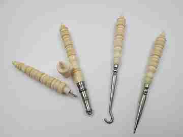 Ladies travel set. Buttons hook, awl, pencil & refills box. Ribbed bone and metal. 1930's
