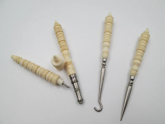 Ladies travel set. Buttons hook, awl, pencil & refills box. Ribbed bone and metal. 1930's