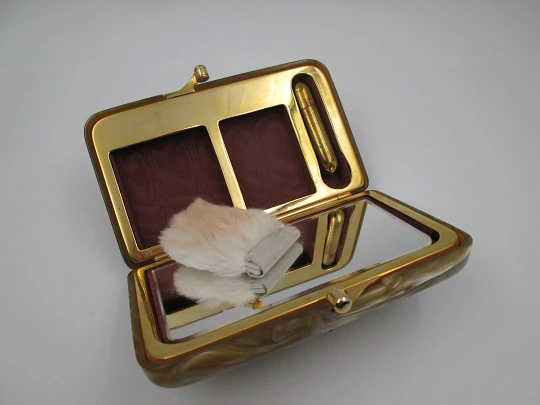 Ladie's vanity handbag. Marble celluloid and gold plated metal. United States. 1950's