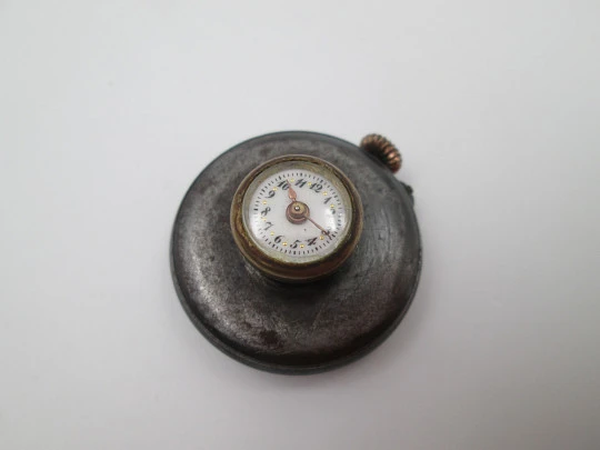 Lapel watch. Iron & gold plated metal. Stem-wind / pin-set movement. 1890's. Swiss