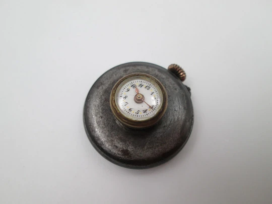 Lapel watch. Iron & gold plated metal. Stem-wind / pin-set movement. 1890's. Swiss