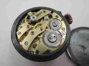 Lapel watch. Iron & gold plated. 1890's. Stem-wind. Pin-set. White dial