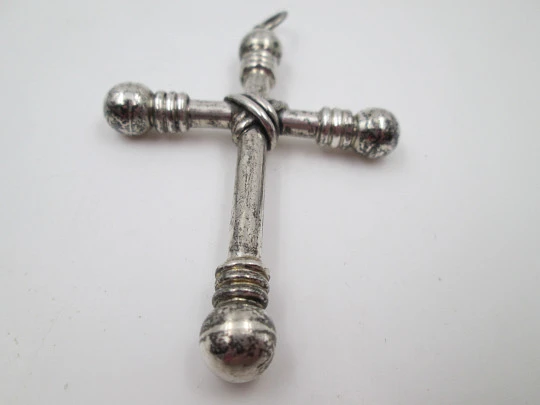 Large cross pendant. Sterling silver. Arms with balls ends and cords motifs. 1930's. Spain