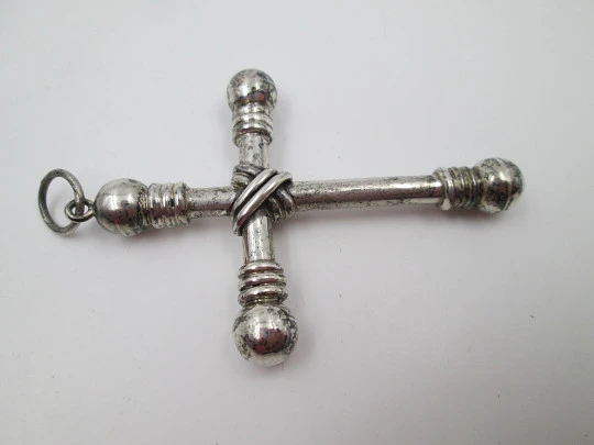 Large cross pendant. Sterling silver. Arms with balls ends and cords motifs. 1930's. Spain