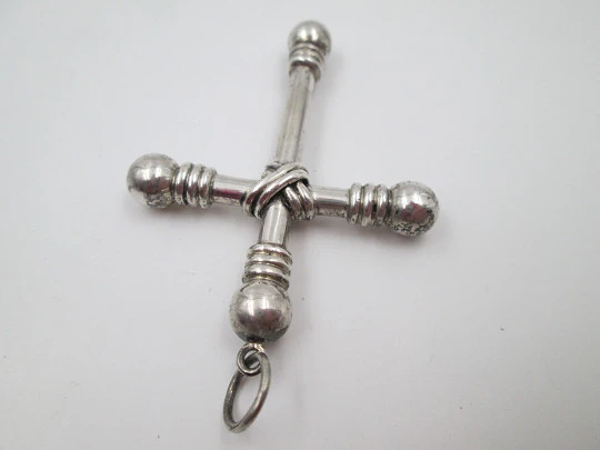 Large cross pendant. Sterling silver. Arms with balls ends and cords motifs. 1930's. Spain