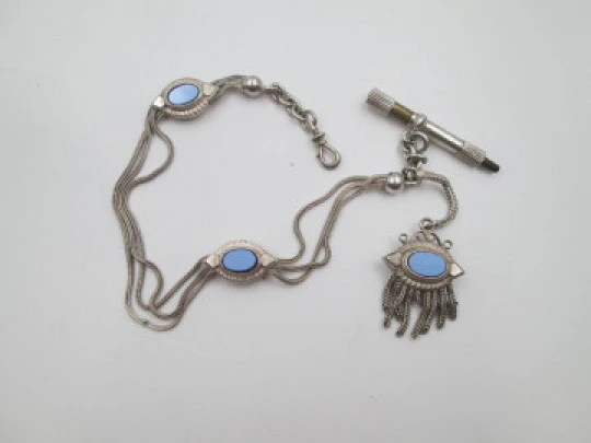 Leontina tres hilos reloj bolsillo. Plata y piedras azules. Llave, colgante y correderas