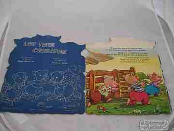 Libro troquelado. Los tres cerditos.  Grafos. 1961. Cuento popular