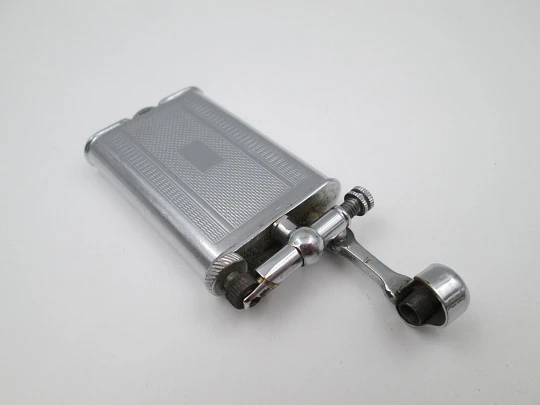 Lift arm manual Polo petrol lighter. Silver plated brass. Waves pattern. United Kingdom Lift arm manual Polo petrol lighter. Silver plated brass. Waves pattern. United Kingdom