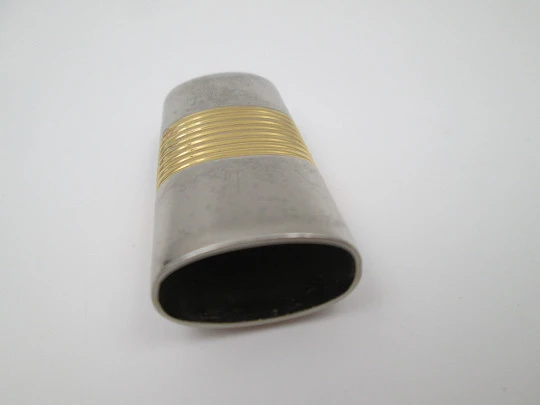 Loewe lighter cover. Silver and gold plated metal. Brand logo. Spain. 2010