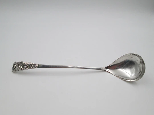 Long serving spoon. 800 sterling silver. Curved handled. Flowers and leaves. 1970's